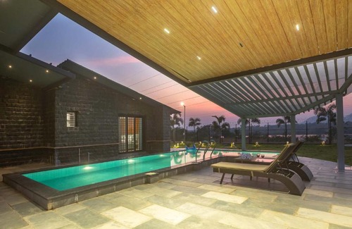 Gondedumala Villa | StayVista's Le Ciel - Lakeside Retreat Amidst Farmland with Pool, Indoor Activities, Lawn, Bonfire Pit & Ample Seating Space