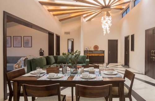 Gondedumala Villa | StayVista's Le Ciel - Lakeside Retreat Amidst Farmland with Pool, Indoor Activities, Lawn, Bonfire Pit & Ample Seating Space