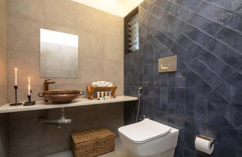 Gondedumala Villa | StayVista's Le Ciel - Lakeside Retreat Amidst Farmland with Pool, Indoor Activities, Lawn, Bonfire Pit & Ample Seating Space