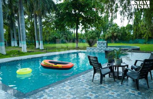 Bhopal Villa | StayVista's Palm Perle Villa - Pet-Friendly Retreat with Terrace & Lawn