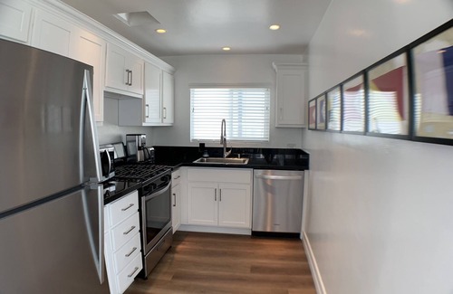 Balboa Peninsula Apartment | Steps to Beach and Bay with Garage Parking (compact car) & Air Conditioning!