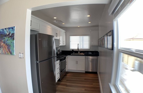 Balboa Peninsula Apartment | Steps to Beach and Bay with Garage Parking (compact car) & Air Conditioning!