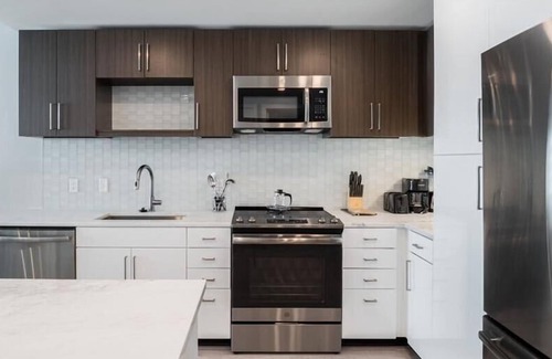 Woodmont Triangle Apartment | Steps to Metro | Full Kitchen + W/D | Near Chevy Chase| by GLS