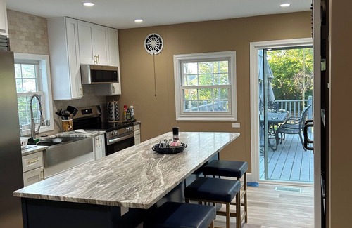 Wooded Estates House | STEPS TO ND STADIUM! Newly Remodeled 4-bdrm, 3 bath on .6 acres with lrg deck