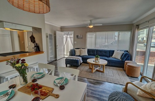 West Newport Apartment | Steps to Sand w/Patio & Fireplace