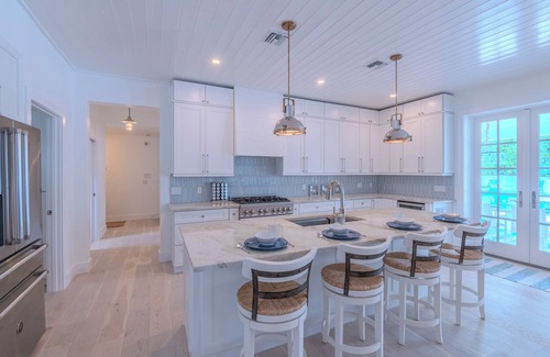 Connors House | Steps to Vanderbilt Beach, Sleeps 13, Resort-Style Backyard
