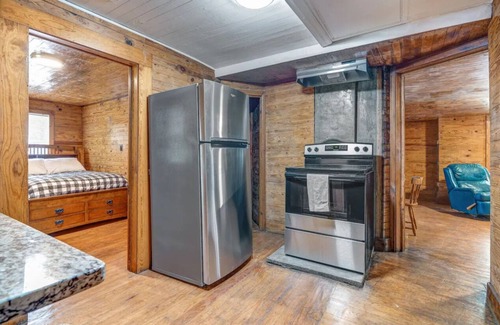 McCalla Cabin | Stone Cottage Convenient to UA, Hoover Met, Golf