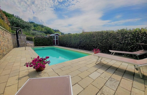 San Romano in Garfagnana Villa | Stone cottage with wonderful loggia, private pool, walk to facilities.
