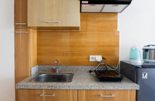 Surabaya Apartment | Strategic Studio Apartment at Orchard Mansion Supermall By Travelio