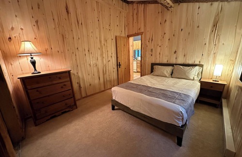 Lyons Cabin | Streamside Cabin nestled in Rock Canyon Walls with Creek flowing through it