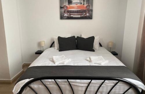 Mogosoaia Apartment | Studio 27mp - Dormitor cu baie proprie - Balcon - Bucatarie complet utilata