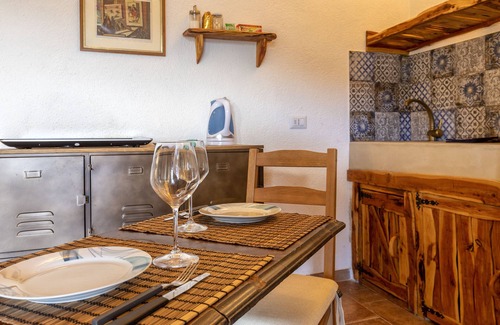 Trinita d'Agultu Apartment | Studio Apartment 'Stazzo Jana' with Sea View, Private Terrace and Air Conditioning