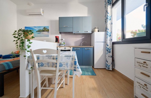 Follonica Apartment | Studio Apartment 'Monoucce' with Wi-Fi and Air Conditioning