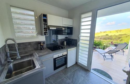 Le Carbet Apartment | Studio Chez Anna - vue mer et piscine