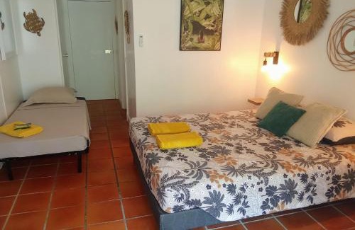 Anse des Rochers Apartment | Studio cosy dans un domaine tropical avec piscine et plage