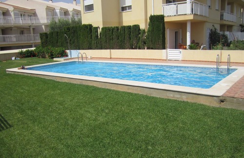 Alcossebre Apartment | Stunning 2 bedroom garden apartment, private garden, communal pool, beach 100m