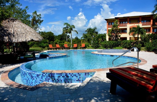 Cocoplum Condo | Stunning 4-bedroom Beachfront Penthouse Inside Exclusive Gated Community.