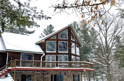 Town of Macomb Cabin | Stunning lake cabin 8 acres of woods, private boat dock, AC, WiFi & dog-friendly
