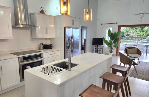 Concordia House | Stunning ocean views, spacious, open-concept, modern luxury & tropical charm.