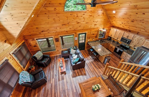 Union Hall Cabin | Stunning SML lakefront cabin: luxurious finishes, spacious rooms, wraparound deck, easy dock access. Family-friendly with toys, media room, serene views!