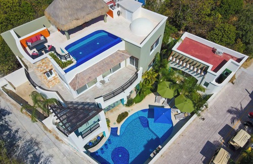 Isla Mujeres House | Stunning Views - New luxury home with 4 king suites, TWO pools and Ocean Access!
