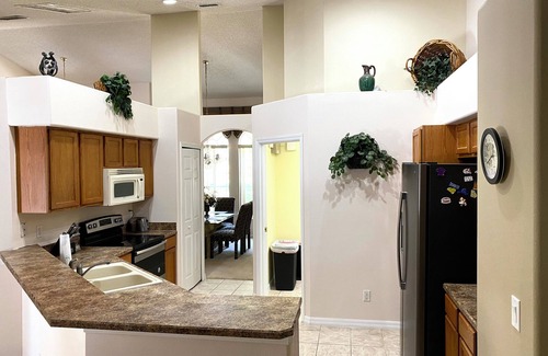 Orange Tree Villa | Stunning Villa w/Solar Heated Pool Near Disney