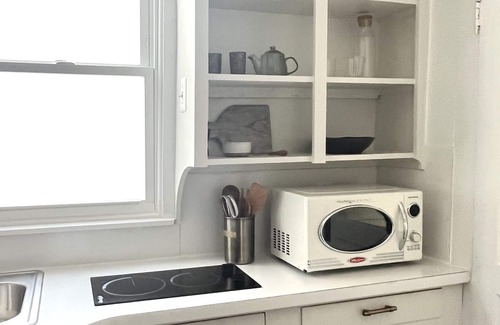 Hughesville Apartment | Stylish 1 BR Apt. w/Sunroom in DT Hughesville