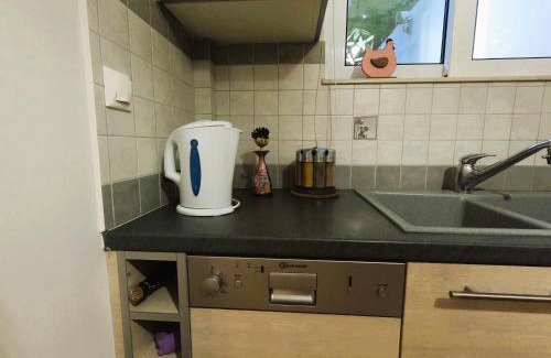 Loutraki Apartment | Stylish 2BR Semi-Basement- Cozy & Family-Friendly Retreat