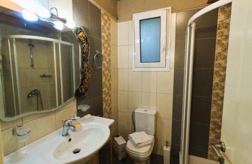 Loutraki Apartment | Stylish 2BR Semi-Basement- Cozy & Family-Friendly Retreat