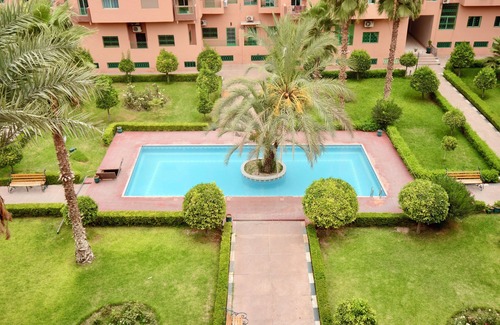 Semlalia Apartment | Stylish & Comfy Gem: 5 Star Location ~ Pool ~ Balcony!