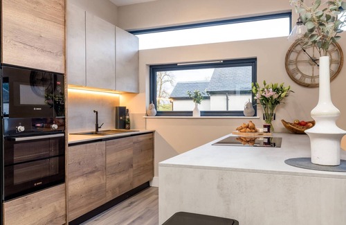 Buchlyvie House | Stylish converted Coach House with hot tub