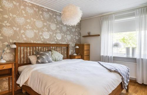 Sibbhult Villa | Stylish Family Retreat with Jacuzzi and Cinema