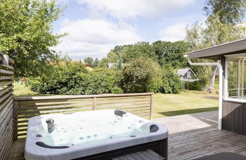 Sibbhult Villa | Stylish Family Retreat with Jacuzzi and Cinema