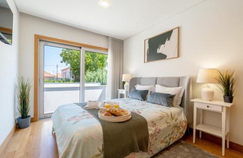 Senhora da Hora House | Stylish Home w/Garage & Terrace by HostWise