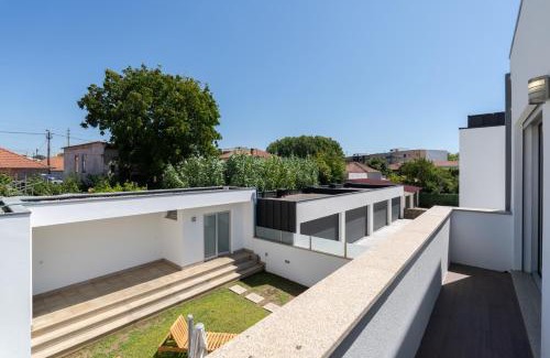 Senhora da Hora House | Stylish Home w/Garage & Terrace by HostWise