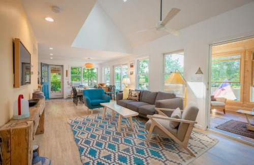 Barnstead House | Stylish lake home with private beach, dock and firepit for swimming, kayaking, hiking