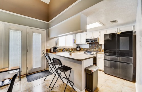 Humble Condo | Stylish loft-style condo with private patio, central AC, & W/D - dog-friendly