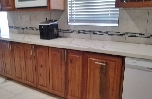 Nicholls Town House | Stylish modern home with all amenities in quiet neighbourhood. Sleeps four.