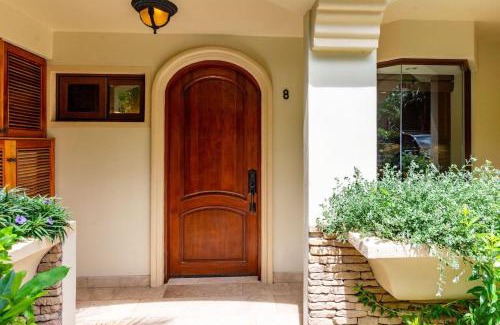 Playa Flamingo House | Stylish Split-Level Condo with a Shaded Terrace, Direct Beach Access, and Resort-Style Community Amenities