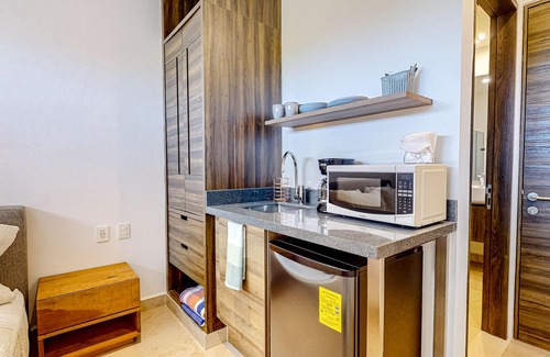 Akumal Apartment | Stylish studio near beach with rooftop pool, partial AC, & free WiFi