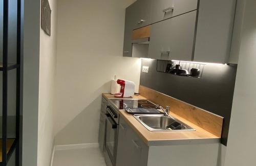 Vardaris Apartment | Stylish Urban Rental Unit With Private Entrance #E1