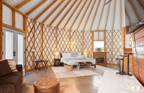 Stanley Cottage | Stylish yurt with luxurious king bed.