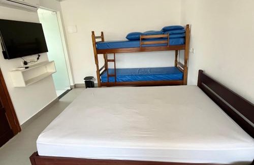 Jardim Carolina House | Suíte com ar condicionado e Wi-Fi