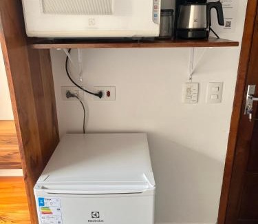 Jardim Carolina House | Suíte com ar condicionado e Wi-Fi