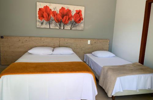 Capitolio House | Suíte com Vista para o Lago em Capitólio, acesso a piscina adulto e infantil, quadra de beach tênis e playgroud