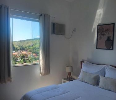 Conservatoria House | Suíte confortável com ar condicionado 101