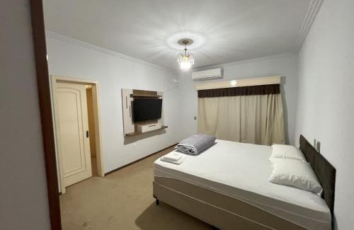 Sinop House | Suíte de luxo no centro com closet e hidromassagem
