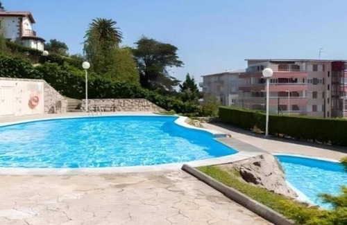 Suances Apartment | Suances con garaje privado, piscina , pie de playa