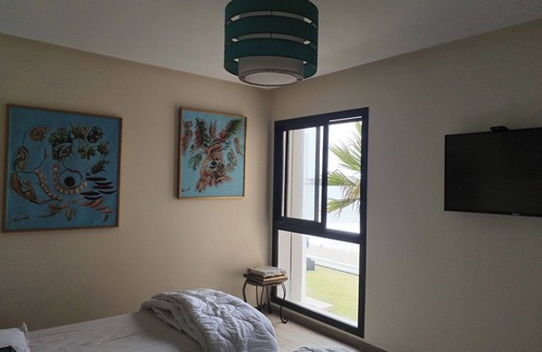 Plage des Nations Bed & Breakfast | Sublime room facing the sea: beach, swimming pool, golf course, complimentary breakfast.