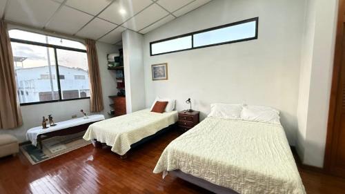 Cooperativa Empleados Consejo Provincial House | SUITE 2 CAMAS, TV, WIFFI, PARKING, a 3 MINUTOS DEL AEROPUERTO DE GUAYAQUIL, LAS GARZAS SAN MARINO SHOPPING